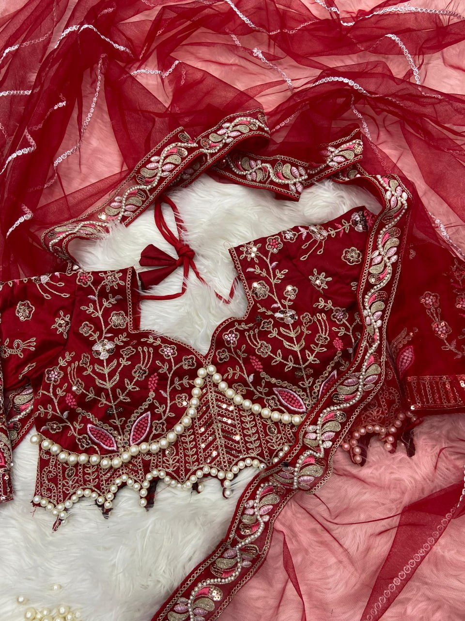 Elegant Red Embroidered Saree with Pearl and Net Detailing