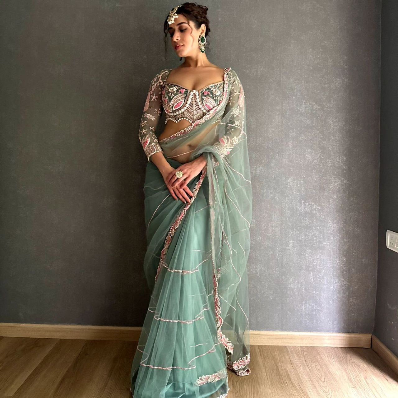 Elegant Green Embroidered Saree with Pearl and Net Detailing